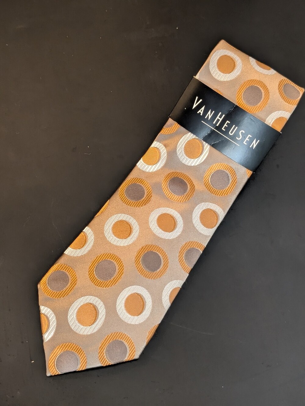 Van Heusen Tan Tie with Orange and Silver Ring Motif